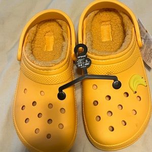 Orange insulated crocs